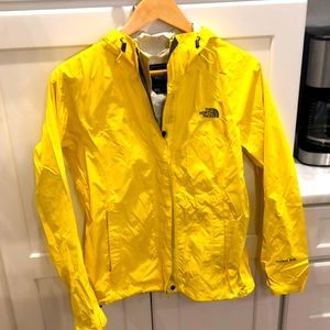 NorthFace raincoat; women’s small; vibrant yellow; zipper plus Velcro up front